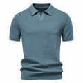 Blue men's open-collar textured knit polo on an invisible mannequin